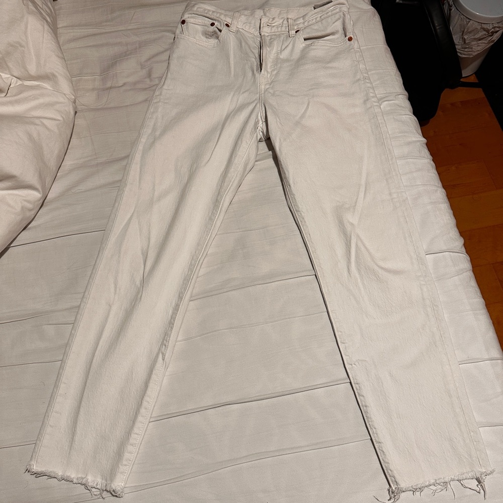 Levi’s white jeans with raw hem
